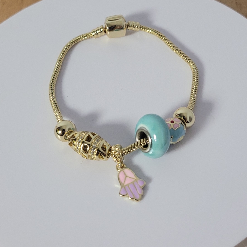 Elegant Gold Plated Bracelet with Pastel Charms